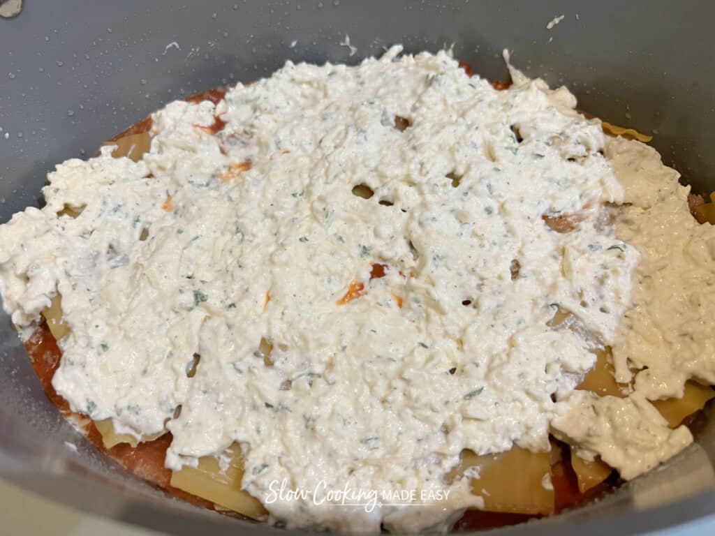 the ricotta cheese layer of lasagna in the slow cooker